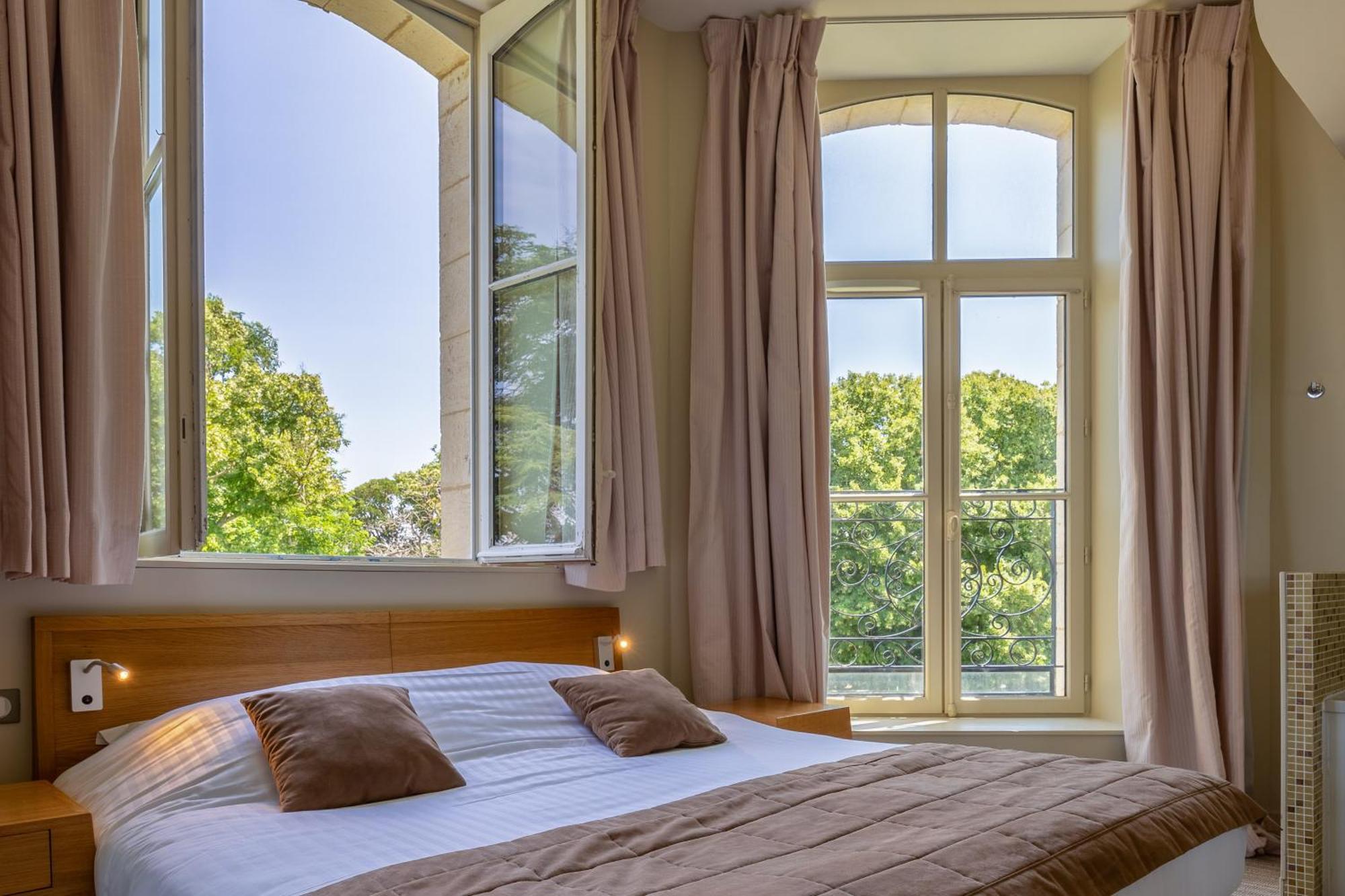 Hotel Et Spa Du Chateau Lagord Habitación foto