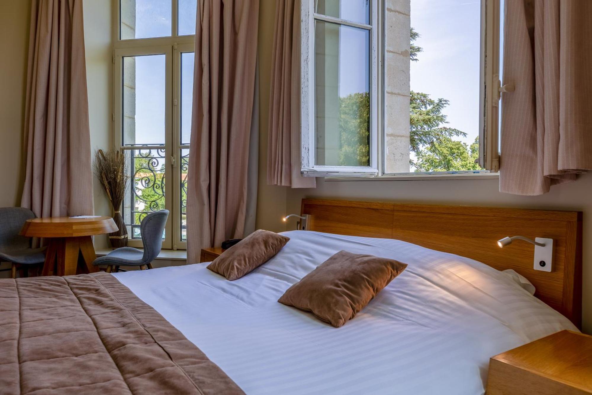 Hotel Et Spa Du Chateau Lagord Habitación foto